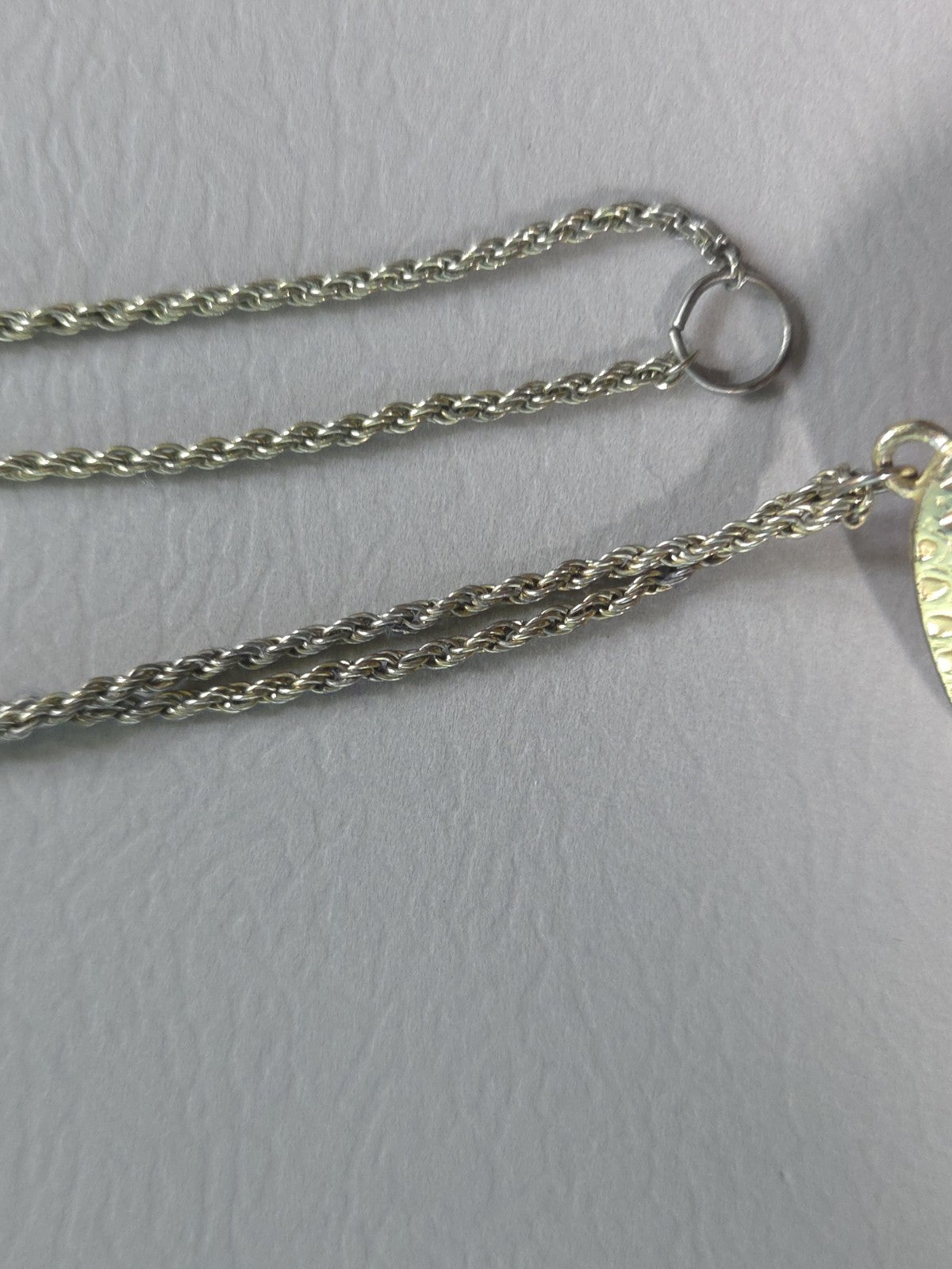 Vintage Estate Jewelry - faceted coral-colored pendant on a goldtone chain