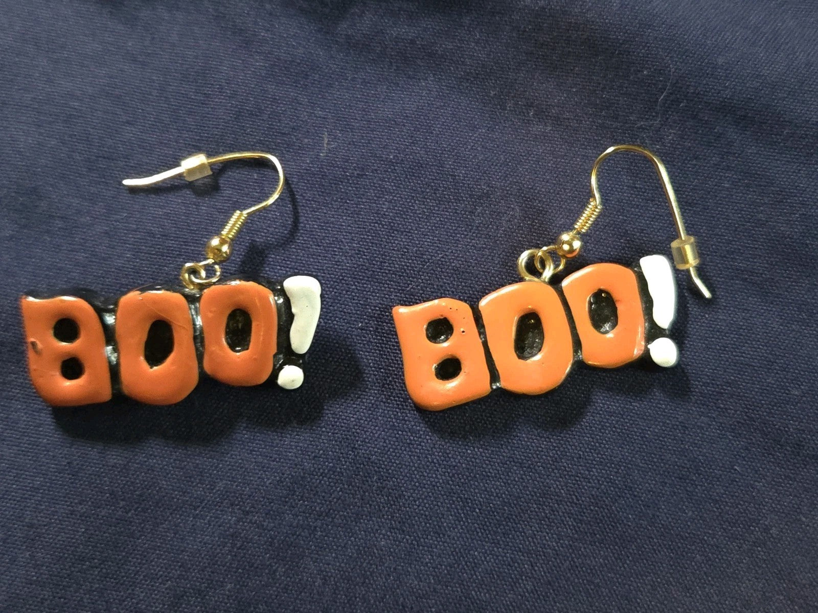 Vintage orange and black "BOO!" dangling earrings