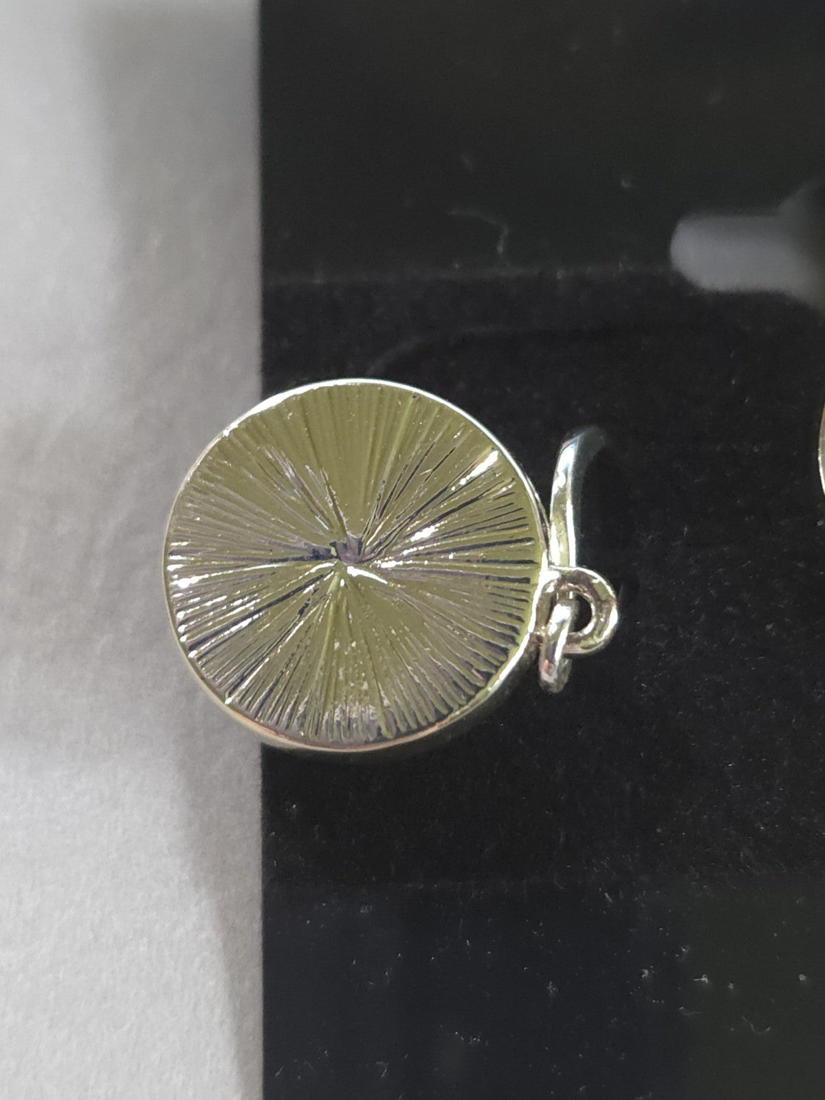 silver-tone drop earrings featuring polished, round pink rose quartz cabochons