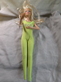 1990s Coca-Cola themed Barbie doll featuring a green bodysuit