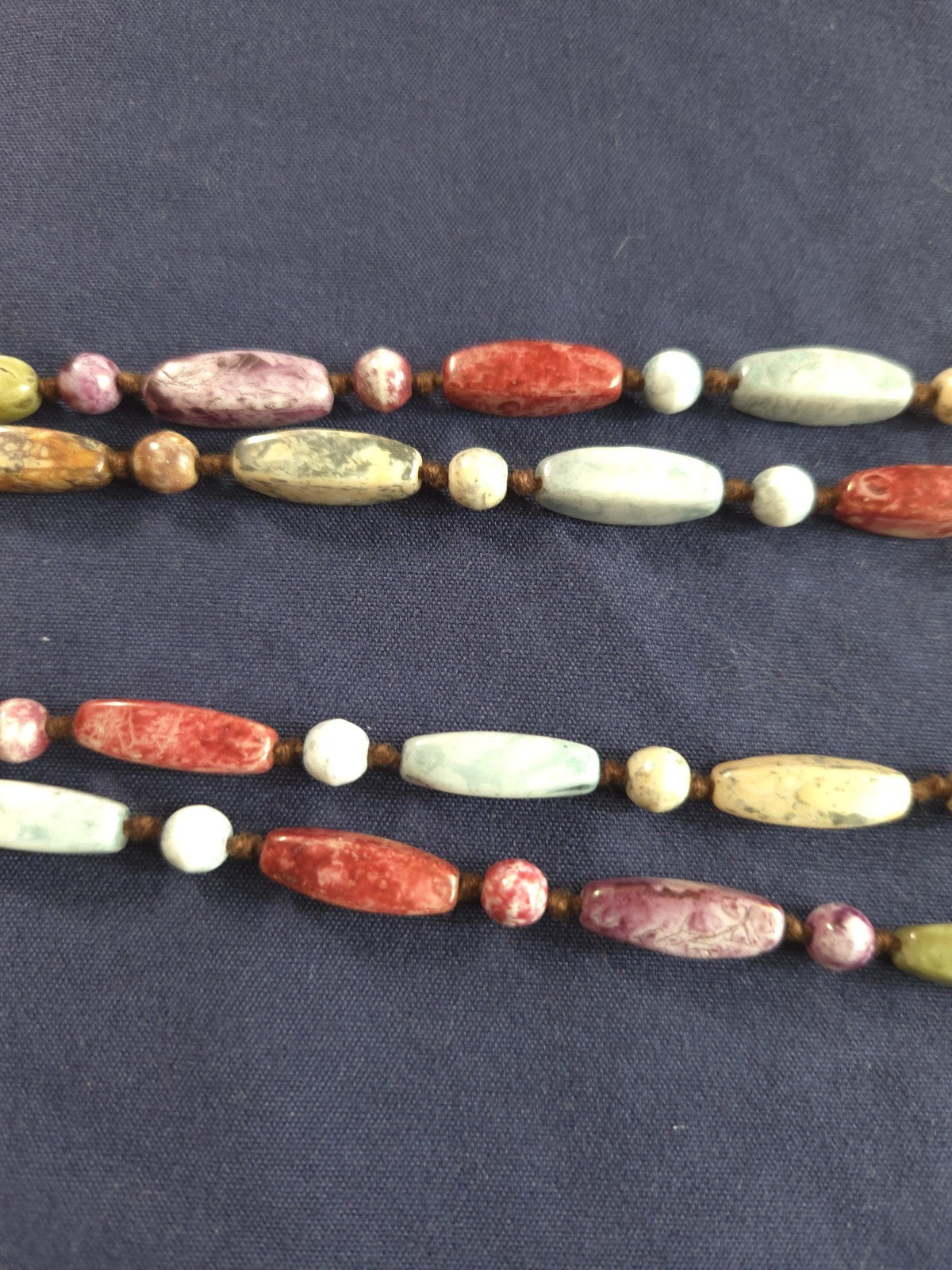 Vintage beaded necklace featuring colorful Round and Long beads
