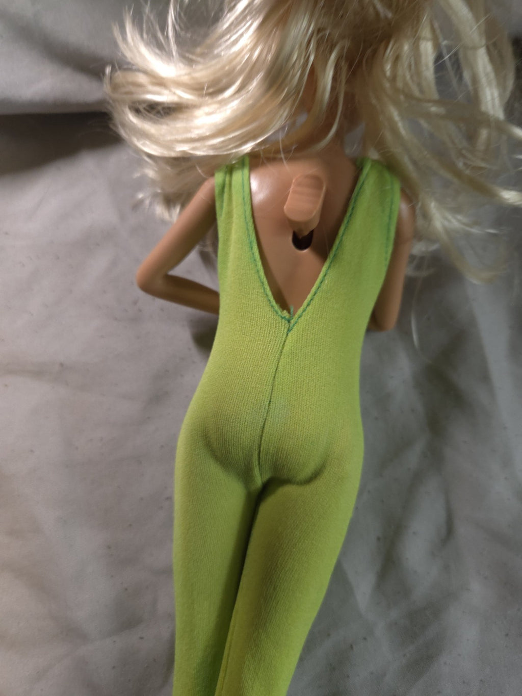 1990s Coca-Cola themed Barbie doll featuring a green bodysuit
