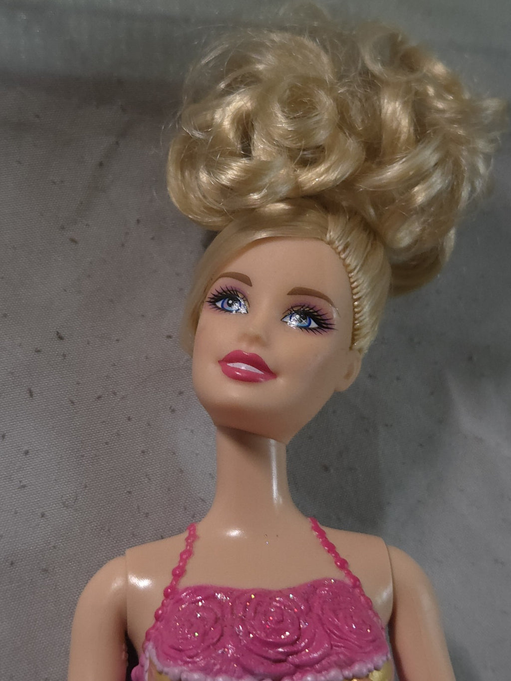 Mattel Barbie Fashionistas doll from the first wave featuring a rose and gold...