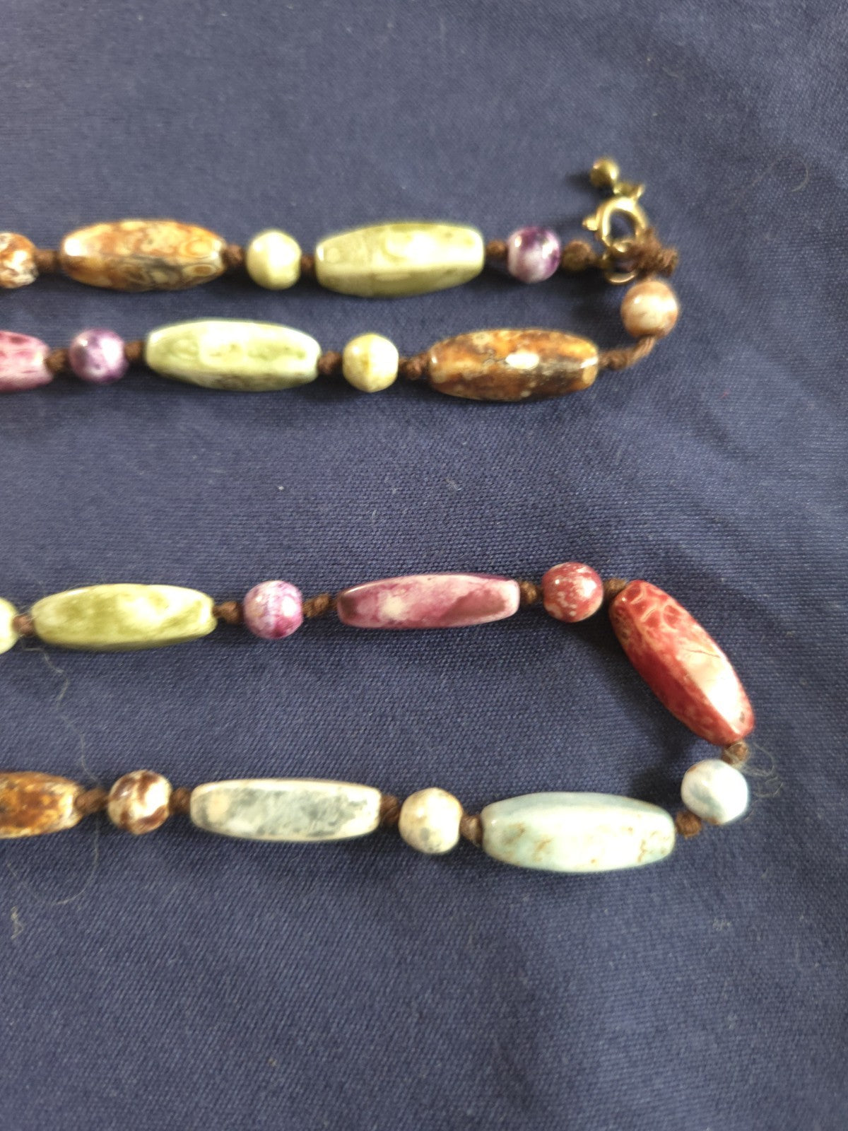 Vintage beaded necklace featuring colorful Round and Long beads