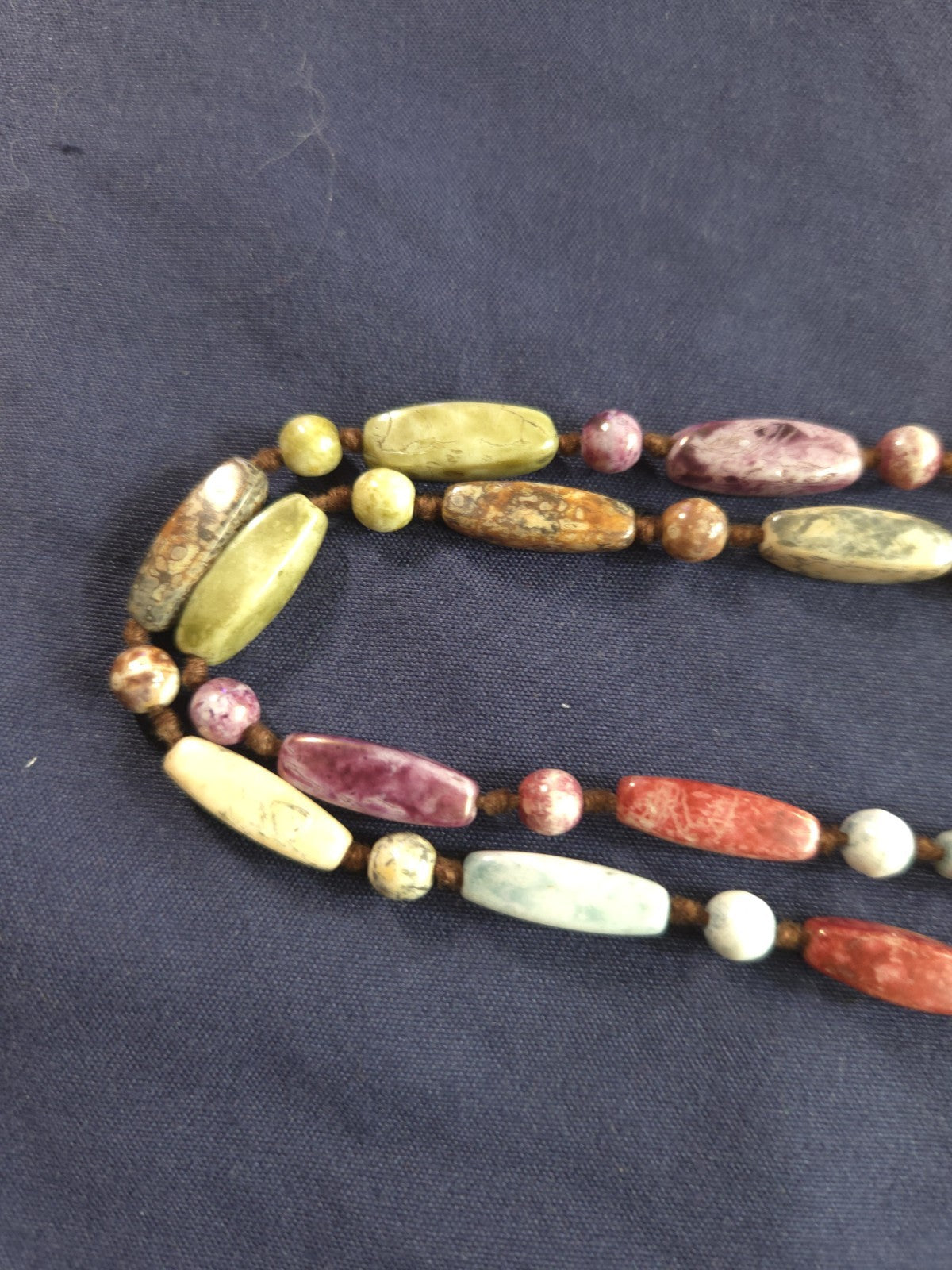 Vintage beaded necklace featuring colorful Round and Long beads