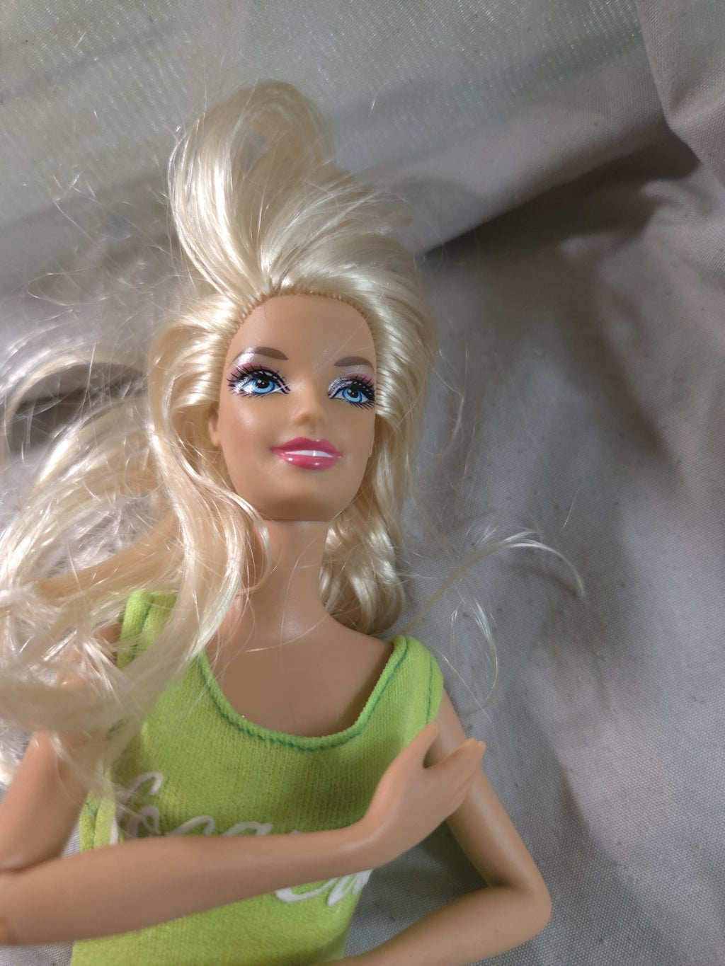 1990s Coca-Cola themed Barbie doll featuring a green bodysuit