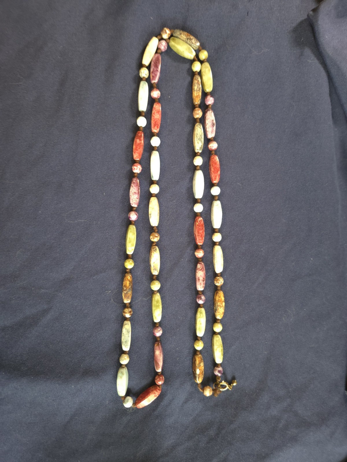 Vintage beaded necklace featuring colorful Round and Long beads