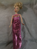 Mattel Barbie Fashionistas doll from the first wave featuring a rose and gold...