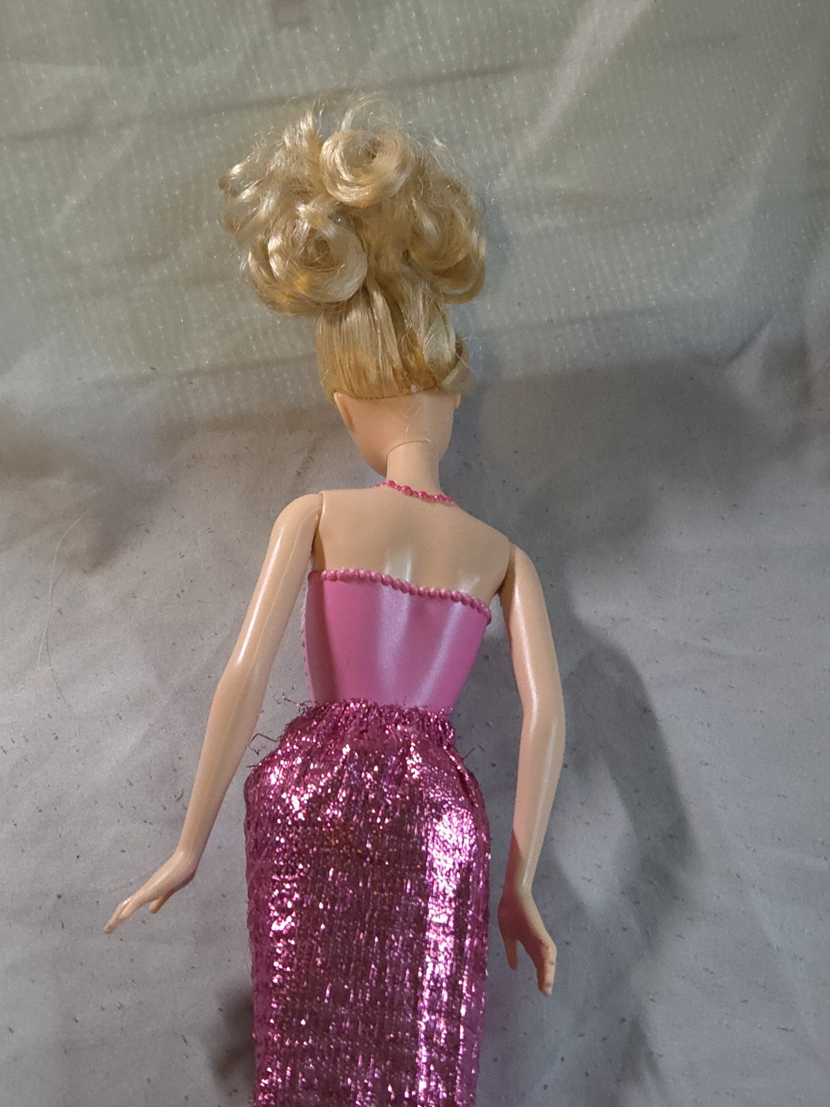 Mattel Barbie Fashionistas doll from the first wave featuring a rose and gold...