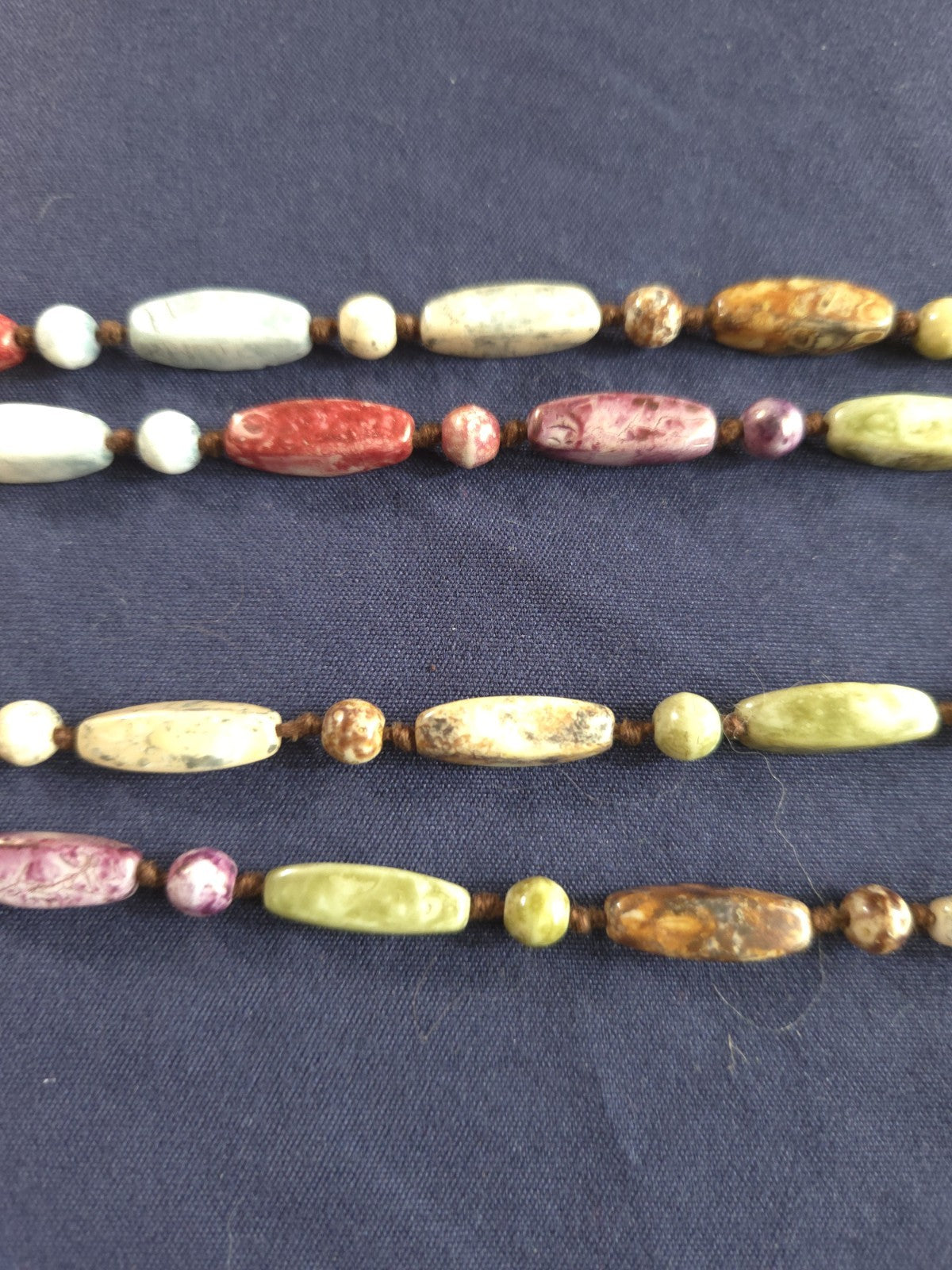 Vintage beaded necklace featuring colorful Round and Long beads
