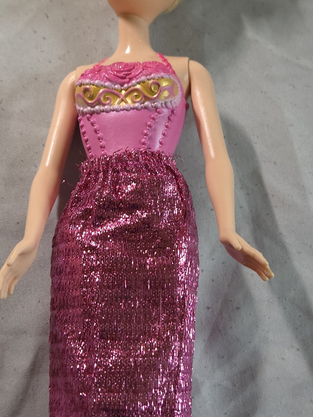 Mattel Barbie Fashionistas doll from the first wave featuring a rose and gold...